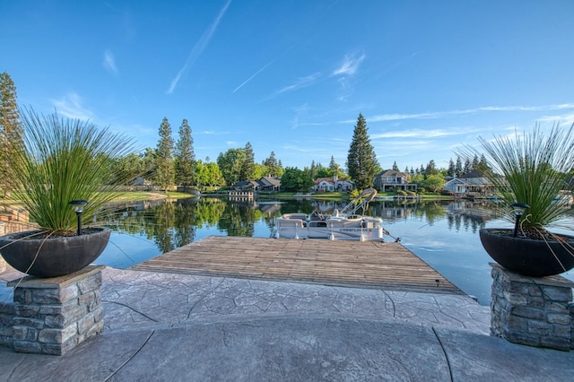 dock area with a water view