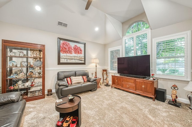 carpeted living area with ceiling fan, visible vents, baseboards, lofted ceiling, and recessed lighting