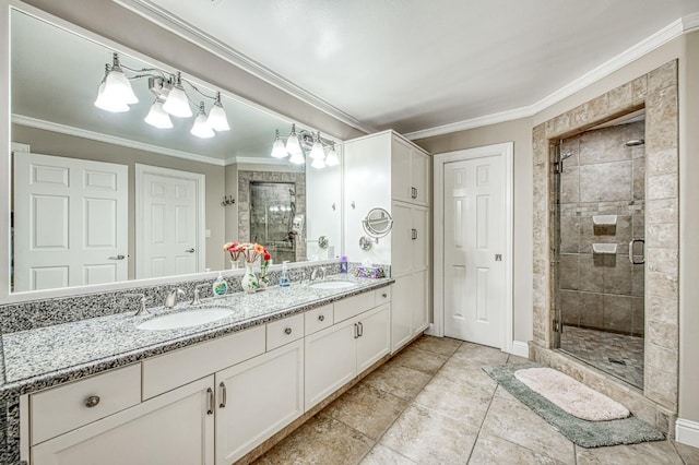 full bathroom featuring double vanity, a sink, a stall shower, and ornamental molding