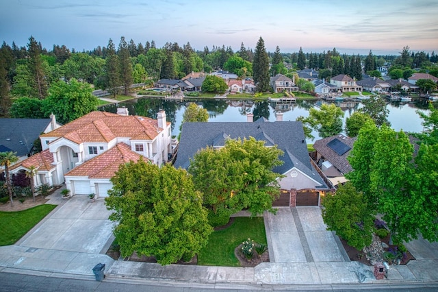 aerial view with a water view and a residential view