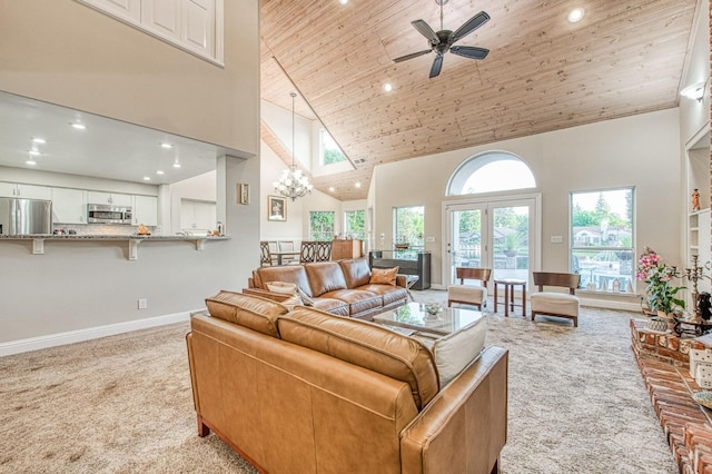 living area with light carpet, baseboards, high vaulted ceiling, recessed lighting, and wood ceiling