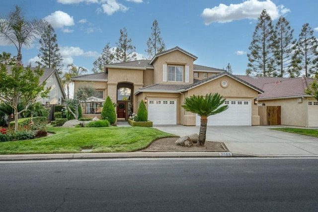 traditional home with a garage, a front lawn, fence, stucco siding, and concrete driveway