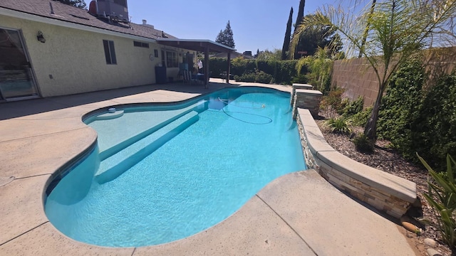 1215 Fremont Ave, Clovis, CA 93612 - view of pool with a fenced in pool, a fenced backyard, and a patio area