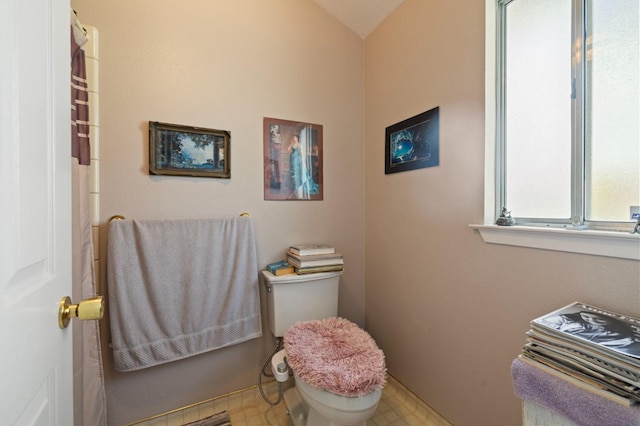 1215 Fremont Ave, Clovis, CA 93612 - bathroom with tile patterned floors and toilet
