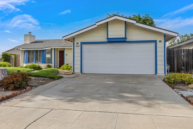1215 Fremont Ave, Clovis, CA 93612 - single story home featuring fence, a chimney, concrete driveway, and roof with shingles
