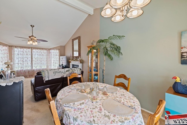 1215 Fremont Ave, Clovis, CA 93612 - dining area featuring light colored carpet, ceiling fan with notable chandelier, and vaulted ceiling with beams