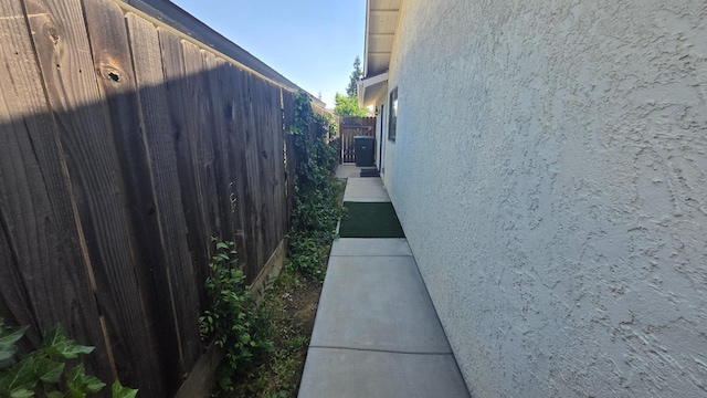 1215 Fremont Ave, Clovis, CA 93612 - view of property exterior featuring stucco siding and fence
