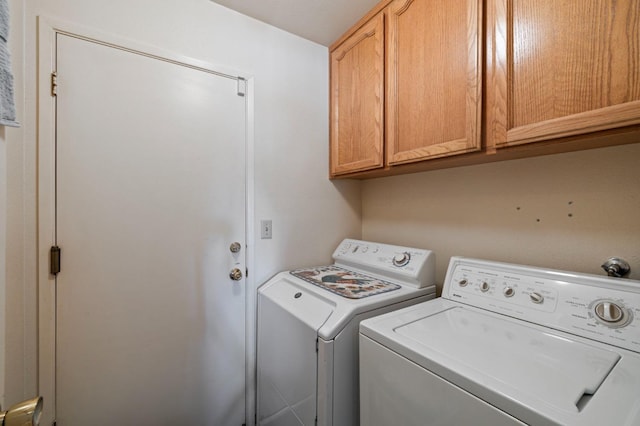 1215 Fremont Ave, Clovis, CA 93612 - clothes washing area featuring washing machine and clothes dryer and cabinet space