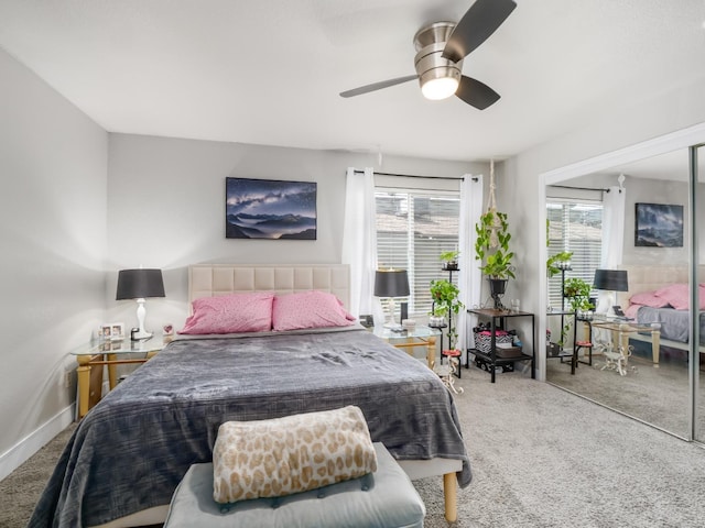 carpeted bedroom featuring ceiling fan