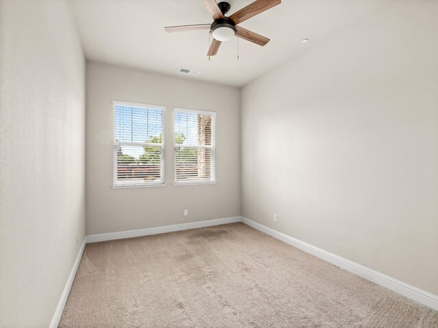 7993 N Justin Ave, Fresno, CA 93720 - empty room with baseboards, ceiling fan, light colored carpet, and visible vents