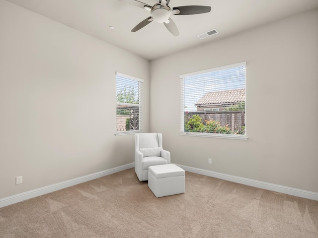 7993 N Justin Ave, Fresno, CA 93720 - living area with baseboards, carpet, a ceiling fan, and visible vents