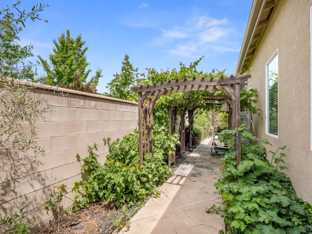 7993 N Justin Ave, Fresno, CA 93720 - view of patio / terrace featuring a pergola and a fenced backyard