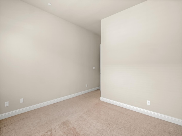 7993 N Justin Ave, Fresno, CA 93720 - spare room featuring baseboards and light colored carpet