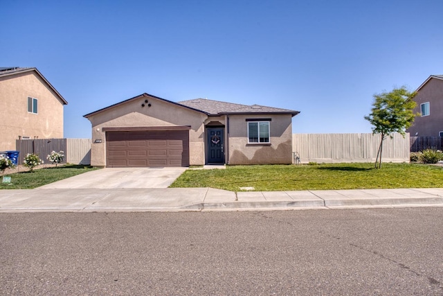 ranch-style home featuring driveway, a front yard, fence, an attached garage, and stucco siding