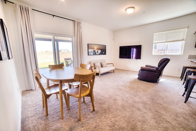 view of carpeted dining room