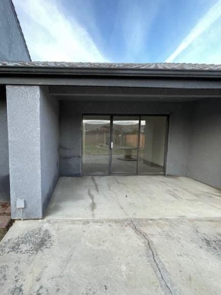 2791 W Kofoid Ave, Caruthers, CA 93609 - exterior space featuring a patio and stucco siding