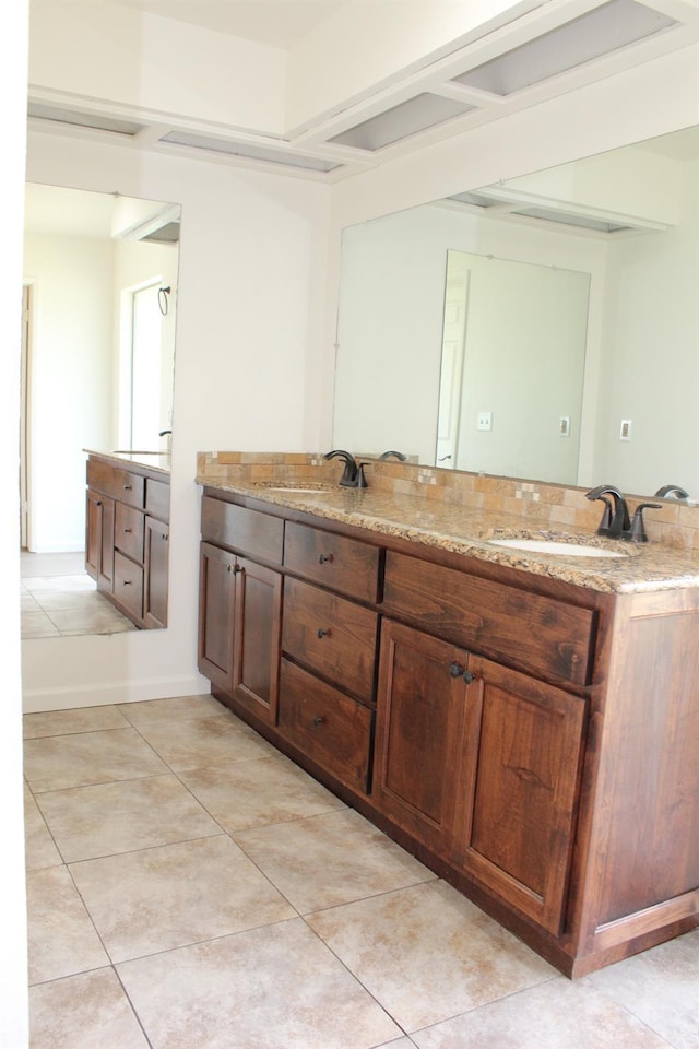 2791 W Kofoid Ave, Caruthers, CA 93609 - full bathroom featuring double vanity, a sink, and tile patterned flooring