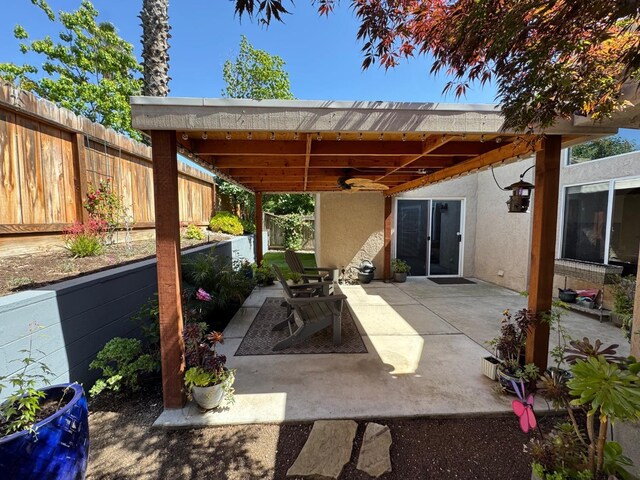 9552 N Whitehouse Dr, Fresno, CA 93720 - fenced backyard featuring a patio