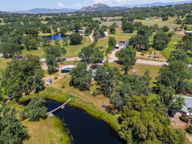 bird's eye view featuring a water and mountain view
