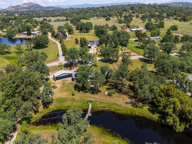 bird's eye view featuring a water and mountain view