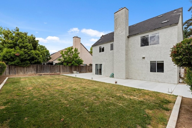 view of yard featuring a patio area and fence