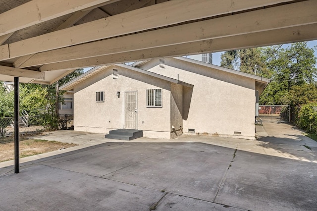 635 N San Pablo Ave, Fresno, CA 93728 - exterior space with stucco siding, fence, crawl space, and a patio
