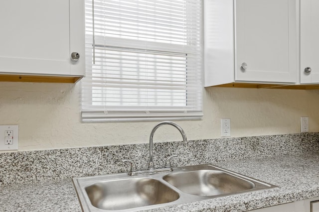 635 N San Pablo Ave, Fresno, CA 93728 - details featuring a sink and white cabinetry