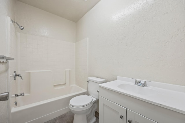 635 N San Pablo Ave, Fresno, CA 93728 - full bathroom with a textured wall, wood finished floors, and toilet