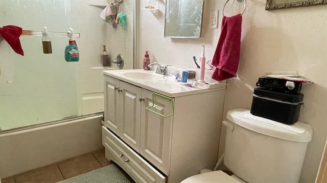 3535 E Grant Ave, Fresno, CA 93702 - bathroom with tile patterned flooring, combined bath / shower with glass door, and vanity
