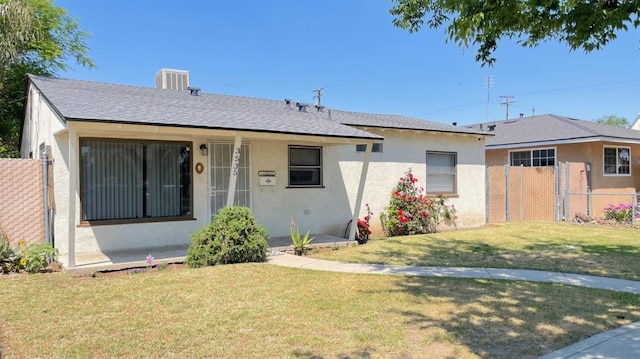 3535 E Grant Ave, Fresno, CA 93702 - single story home with stucco siding and roof with shingles