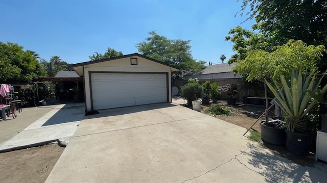 detached garage with fence