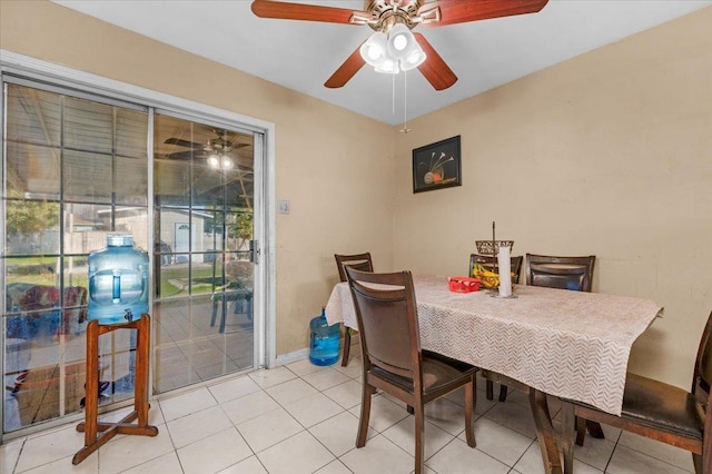 4185 E Turner Ave, Fresno, CA 93702 - dining room with light tile patterned floors, baseboards, and a ceiling fan
