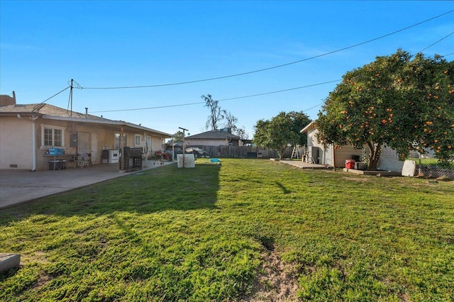 4185 E Turner Ave, Fresno, CA 93702 - view of yard with fence and a patio area