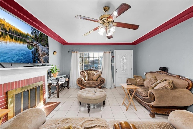 4185 E Turner Ave, Fresno, CA 93702 - tiled living area with crown molding, ceiling fan, and a fireplace