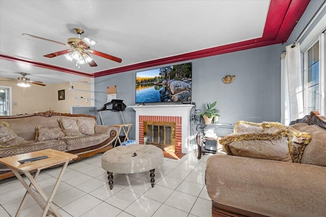 4185 E Turner Ave, Fresno, CA 93702 - living area featuring a brick fireplace, ceiling fan, and light tile patterned floors