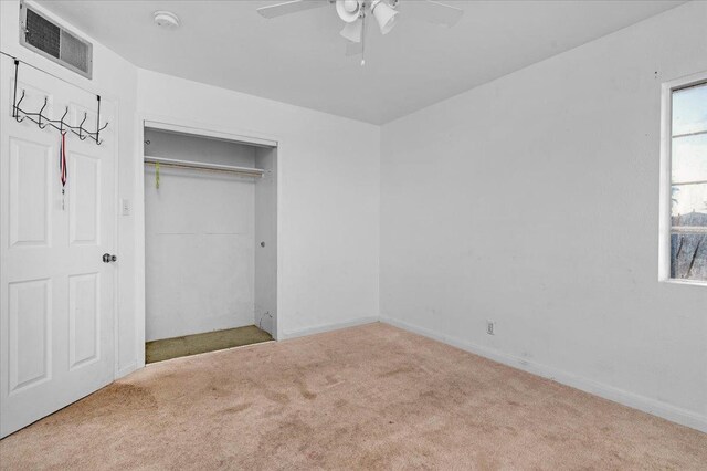 4185 E Turner Ave, Fresno, CA 93702 - unfurnished bedroom with a ceiling fan, visible vents, baseboards, a closet, and carpet flooring