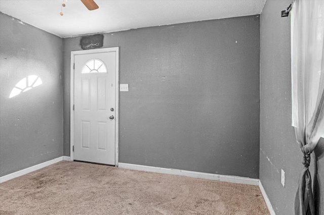 4185 E Turner Ave, Fresno, CA 93702 - entryway featuring baseboards, carpet flooring, and a ceiling fan