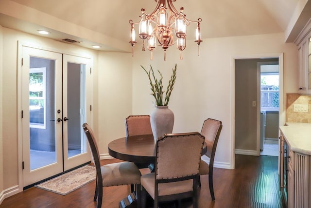 dining area featuring baseboards, french doors, dark wood-style flooring, and visible vents