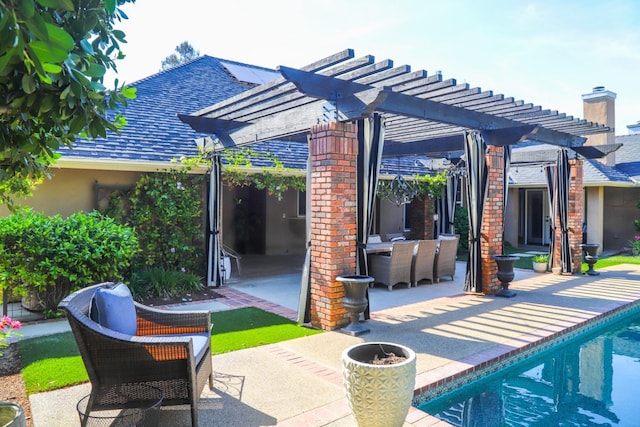 view of patio featuring a pergola and an outdoor pool