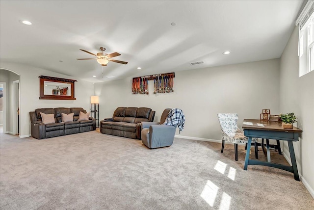 1938 W Van Gogh St, Hanford, CA 93230 - carpeted living room with arched walkways, a ceiling fan, baseboards, recessed lighting, and visible vents