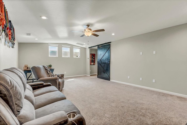 1938 W Van Gogh St, Hanford, CA 93230 - living room featuring baseboards, visible vents, a barn door, and light carpet