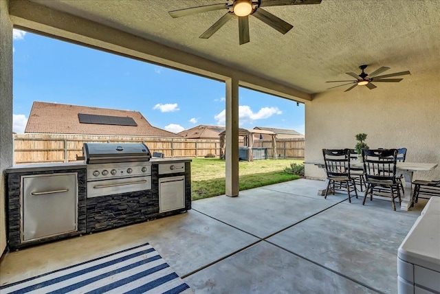1938 W Van Gogh St, Hanford, CA 93230 - view of patio / terrace featuring a grill, outdoor dining area, a fenced backyard, area for grilling, and a ceiling fan