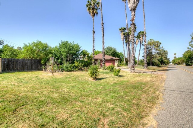 view of yard featuring fence