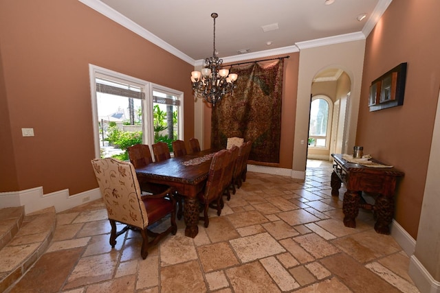 dining area featuring plenty of natural light, stone tile floors, and baseboards