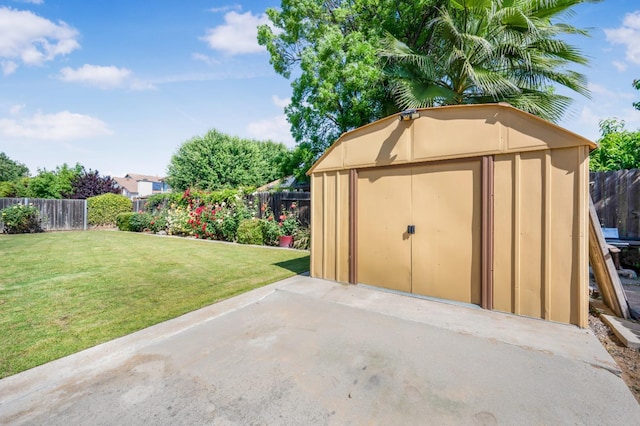 view of shed featuring a fenced backyard