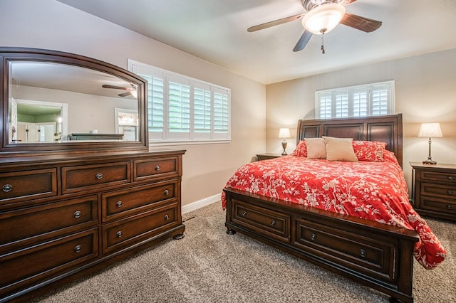 bedroom with carpet floors, a ceiling fan, and baseboards