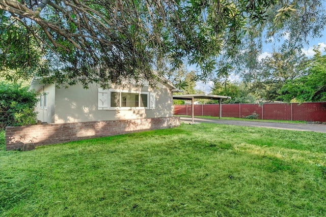 view of yard with fence