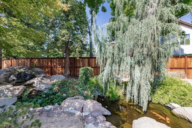 view of yard featuring fence