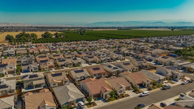aerial view with a mountain view and a residential view