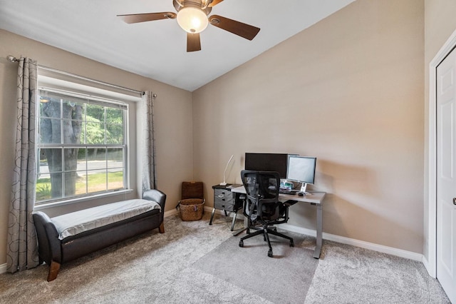 carpeted office featuring baseboards, ceiling fan, and lofted ceiling